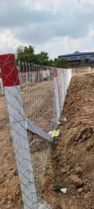 Chain link fence being installed in Chennai