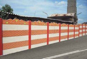 Decorative compound wall with red post panels in Chennai