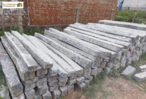 Stacked concrete fencing posts ready for supply in Chennai